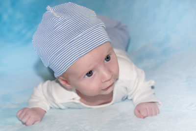 Portrait of cute baby girl lying down