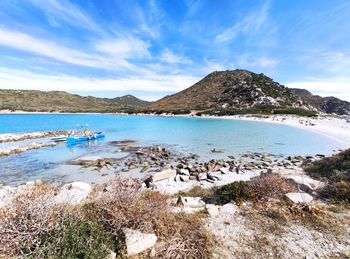 Scenic view of bay against sky