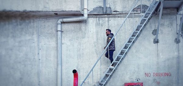 High angle view of man on staircase