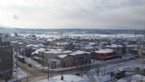 High angle view of townscape against sky during winter