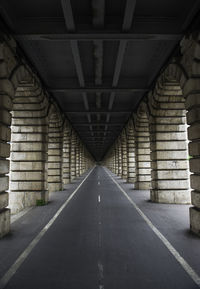 Empty road under bridge 