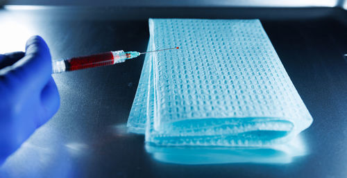 Cropped hand writing in book