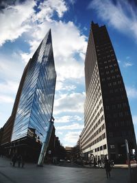 Low angle view of modern buildings against sky