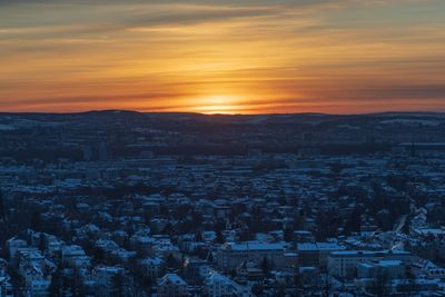 High angle view of townscape against sky during sunset