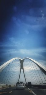 Suspension bridge against sky