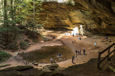 High angle view of people on rocks