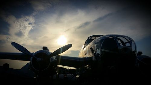 Low angle view of airplanes against the sky