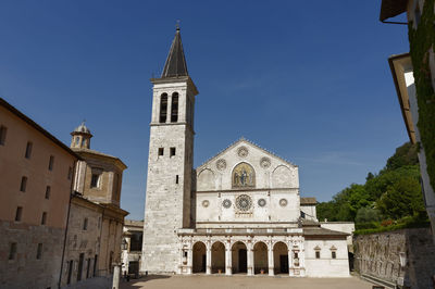 Low angle view of spoleto church against sky