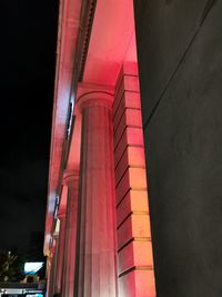 Low angle view of illuminated building at night