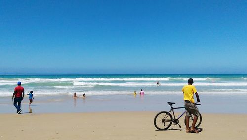 People enjoying at beach