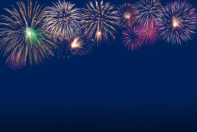 Firework display at night