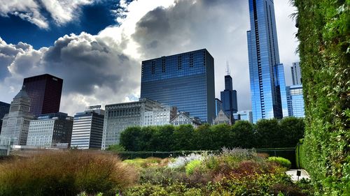 Low angle view of building against cloudy sky