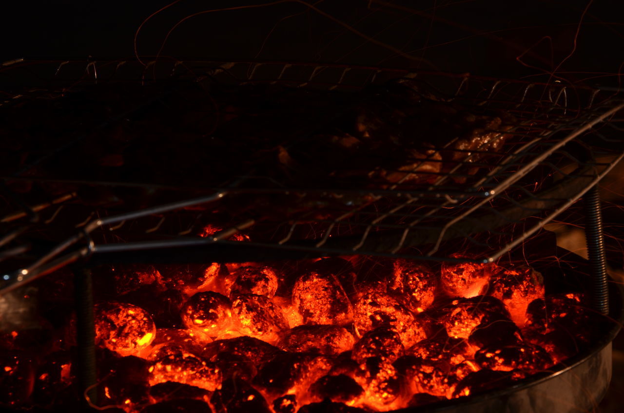 night, illuminated, burning, flame, fire - natural phenomenon, heat - temperature, glowing, firewood, indoors, dark, fire, light - natural phenomenon, bonfire, close-up, lighting equipment, no people, metal, fireplace, heat