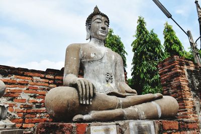 Low angle view of statue against the sky