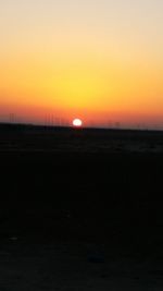 Scenic view of silhouette landscape against sky during sunset