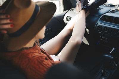 High angle view of people sitting in car