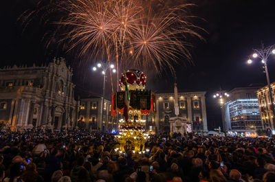 Firework display at night