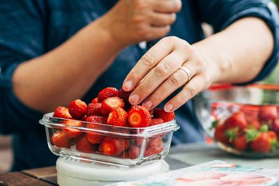 Cropped hand holding ice cream
