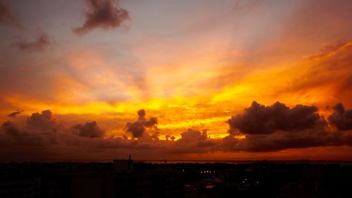 Scenic view of dramatic sky during sunset