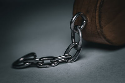 Close-up of chain against black background