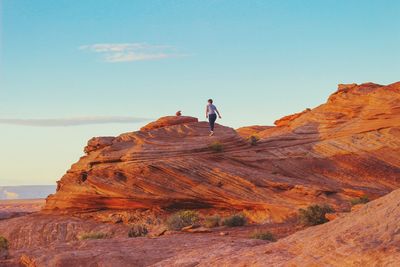 People standing on cliff