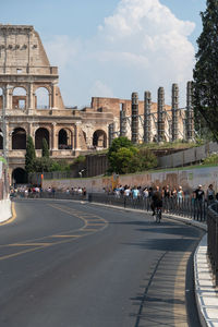 Group of people in front of historical building