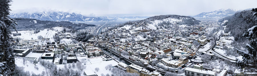 High angle view of snowcapped mountain against sky
