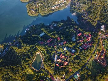 High angle view of buildings by sea