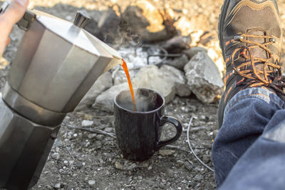 Low section of person preparing food