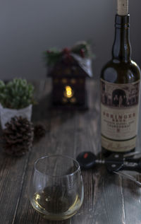 Close-up of wine bottles on table
