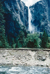 Scenic view of sea against mountain