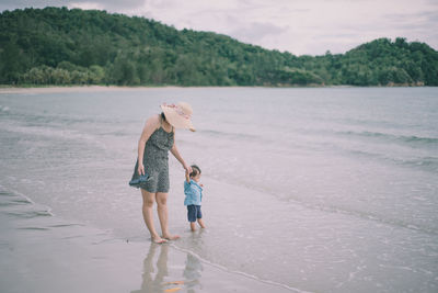 Full length of woman on beach