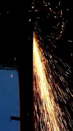 Illuminated factory at night