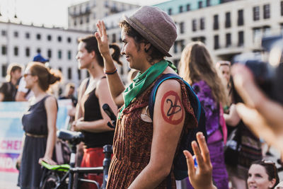 Group of people at street in city