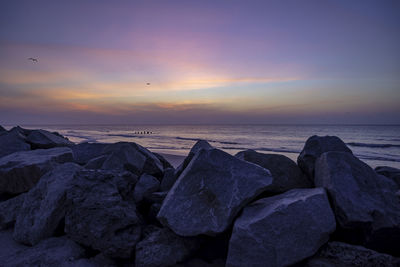 Scenic view of sea against sky during sunset