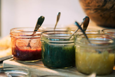 Close-up of drink in glass jar on table