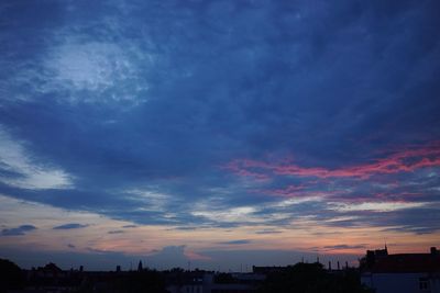 Scenic view of landscape against cloudy sky