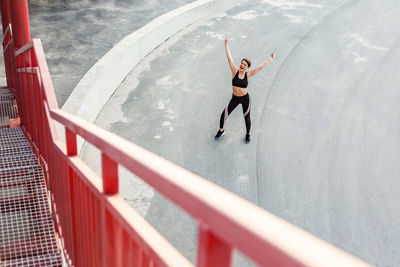 High angle view of woman standing in the sea