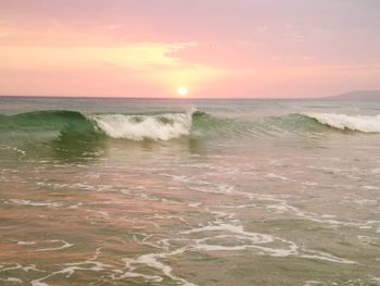 Scenic view of sea at sunset