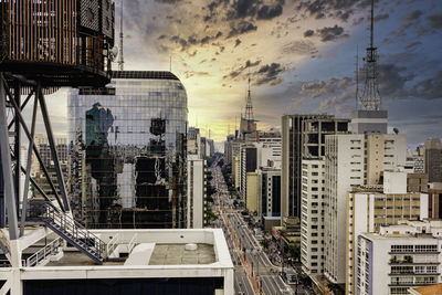 Modern buildings in city against sky