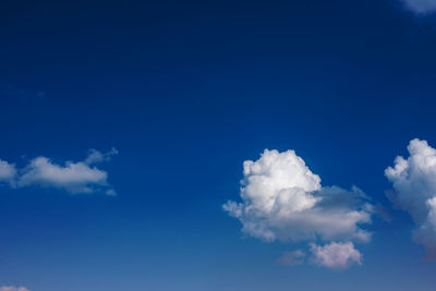 Low angle view of clouds in blue sky