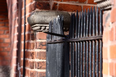 Close-up of metallic structure against wall