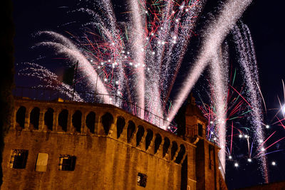 Low angle view of firework display