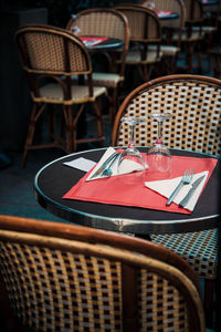 Empty chairs and table in restaurant