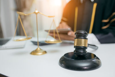 Close-up of clock on table
