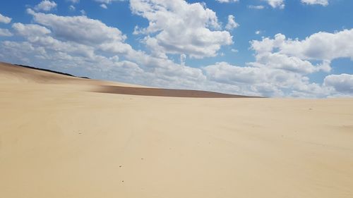 Scenic view of desert against sky