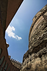 Low angle view of old building against sky