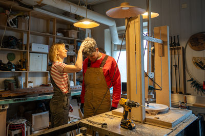 Side view of man working at home