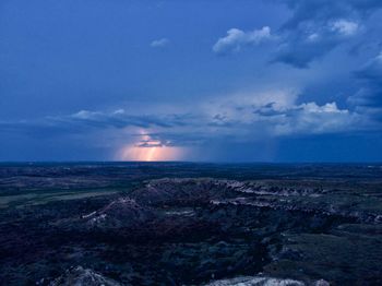 Scenic view of landscape against sky during sunset