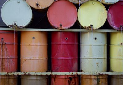 Full frame shot of barrels arranged on shelf